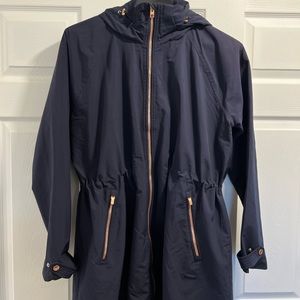 Gorgeous Athleta raincoat. Navy blue with rose gold metal accents.